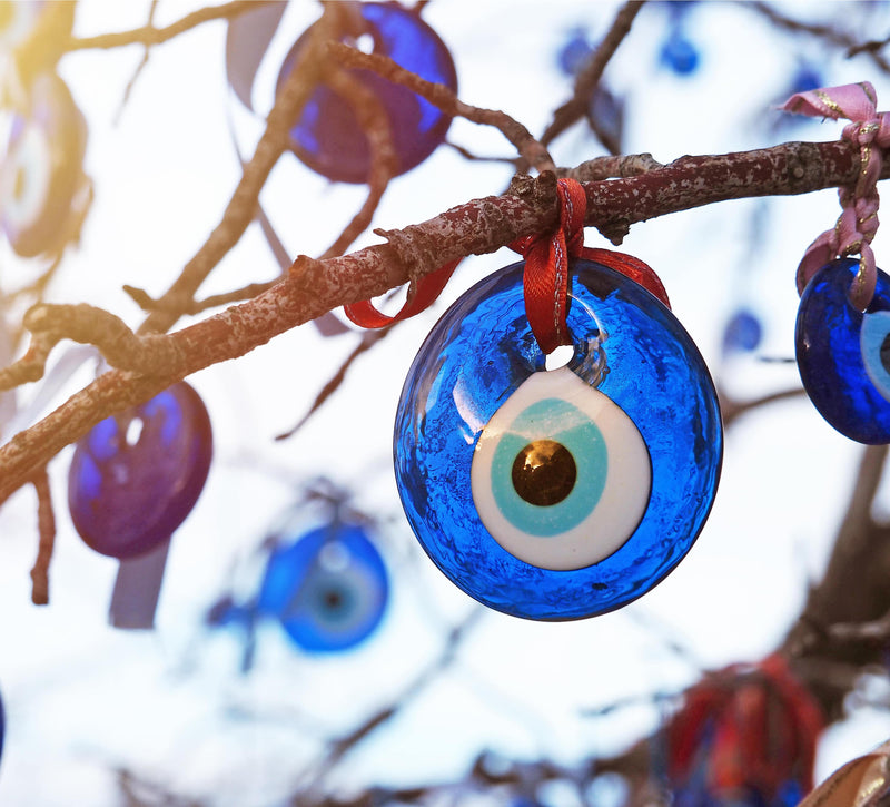What Does The Blue Evil Eye Mean & How to Protect Yourself Using Jewelry - Amorium Jewelry